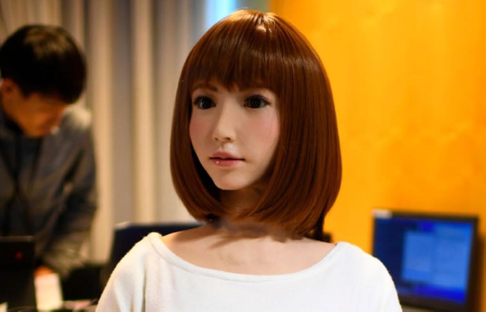A robot created by Japan's Hiroshi Ishiguro Laboratories called Erica is presented at the IROS 2018 International Conference on Intelligent Robots in Madrid. — AFP