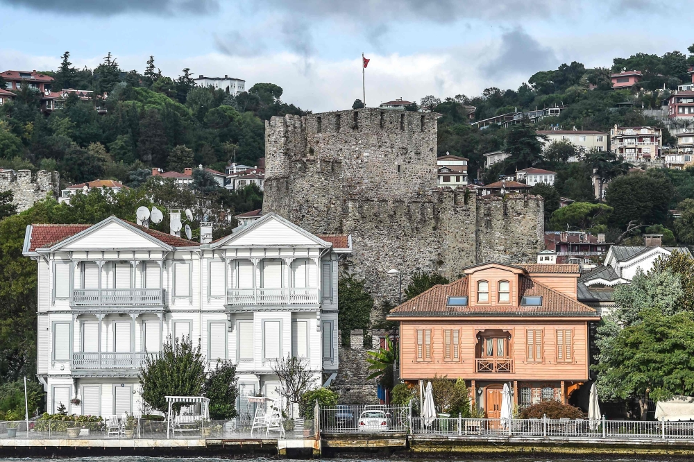


This photograph shows a general view of a waterside mansion on the Bosphorus River coast on the Asian side of Istanbul.  They are among the most iconic sights of Istanbul — magnificent waterside mansions strung out along the Bosphorus as the waters of the strait dividing Europe and Asia lap almost at their front doors. — AFP