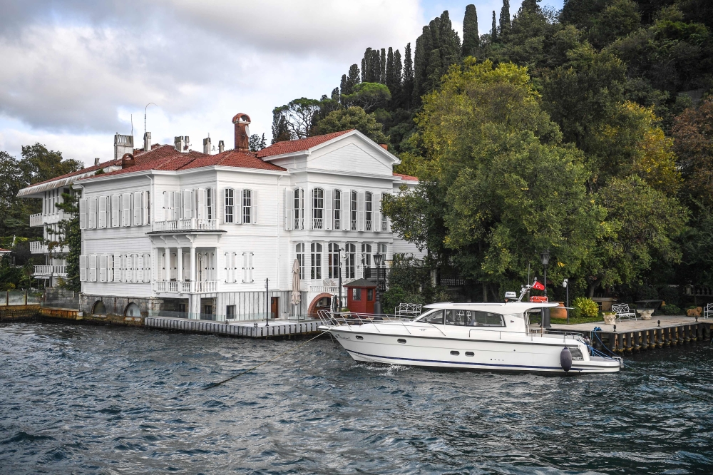 


This photograph shows a general view of a waterside mansion on the Bosphorus River coast on the Asian side of Istanbul.  They are among the most iconic sights of Istanbul — magnificent waterside mansions strung out along the Bosphorus as the waters of the strait dividing Europe and Asia lap almost at their front doors. — AFP