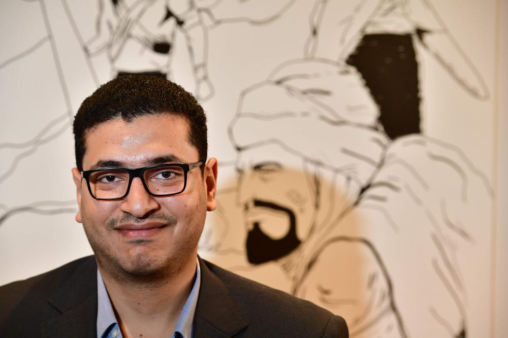 


Comic artist Mumen Hilmi poses in his office in the Gulf emirate of Sharjah. Antara, an Arab poet and war hero is now a star of an Arabic comic book. — AFP