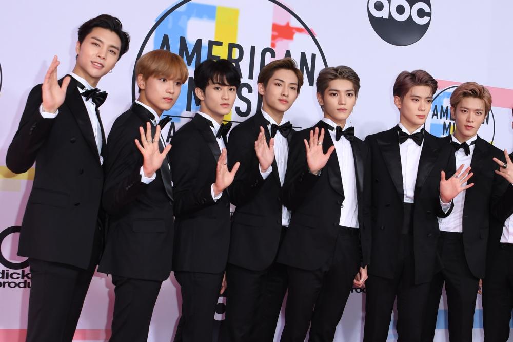


South Korean boy band BTS arrive at the 2018 American Music Awards on Tuesday, in Los Angeles, California. — AFP