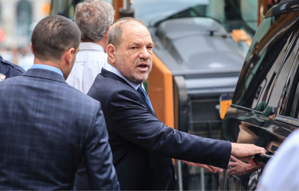 Harvey Weinstein, right, leaves at Manhattan Criminal Court in New York City on Thursday. — AFP