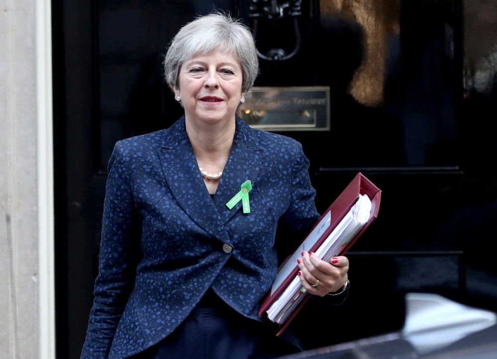 Britain’s Prime Minister Theresa May leaves Downing Street in London in this Oct.10, 2018 file photo. — Reuters