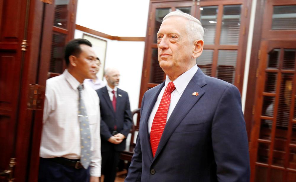 


US Secretary of Defense Jim Mattis arrives for a meeting with Ho Chi Minh City’s communist party chief Nguyen Thien Nhan in Ho Chi Minh City, Vietnam, on Tuesday. — Reuters