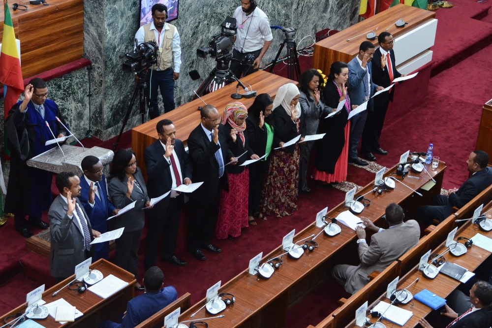 Ethiopia’s newly appointed ministers take their oath of office at the parliament in the capital Addis Ababa on Tuesday. — AFP