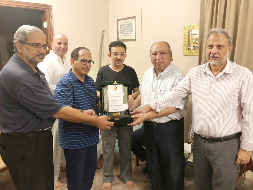 Group Photo of the participants with Absar Syed, sitting 4th from left.