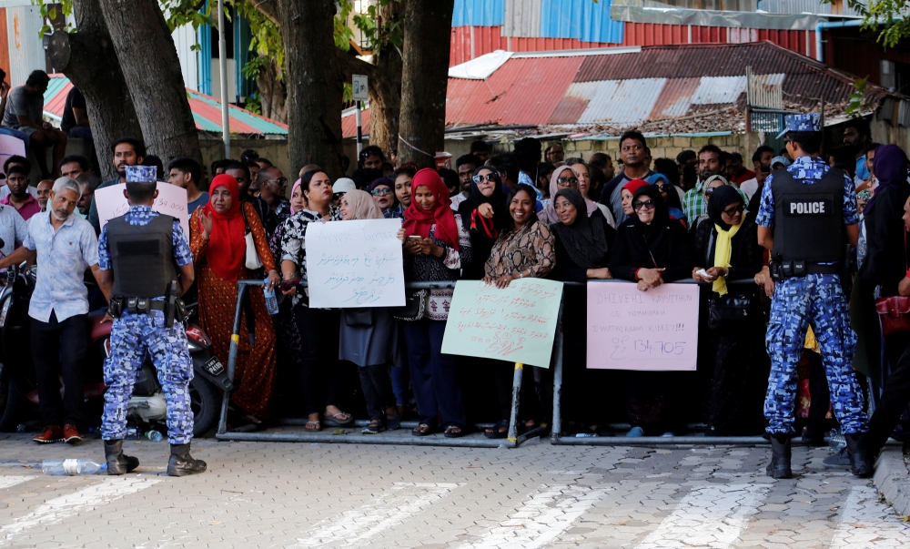 Maldives opposition supporters protest demanding the arrest of defeated President Abdulla Yameen as the Supreme Court of the Maldives began to hear a petition challenging the outcome of last’s month election in Male, Maldives, in this Oct. 14, 2018 file photo. — Reuters