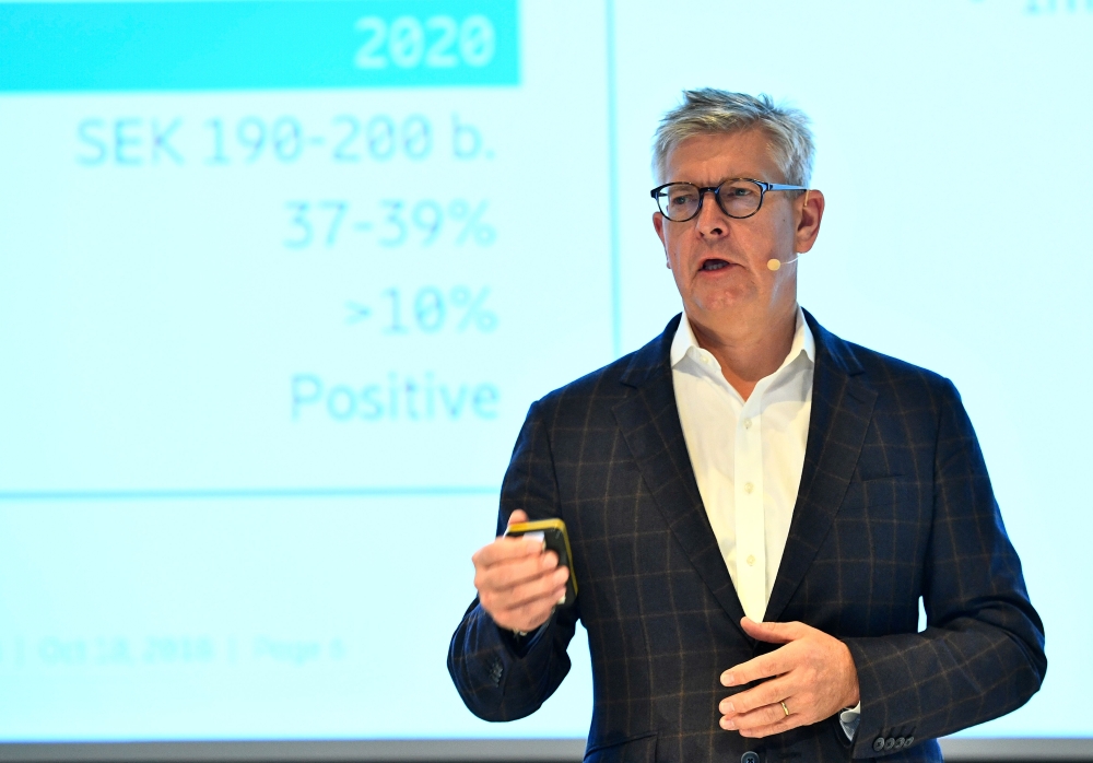 CEO of Swedish telecom giant Ericsson Borje Ekholm presents the company's third quarter results during a press conference in Stockholm, Sweden, on Thursday. Shares in Swedish telecoms firm Ericsson shot up by five percent in early trades on Thursday after it posted better-than-expected third quarter earnings, turning its first net profit in more than two years. — AFP