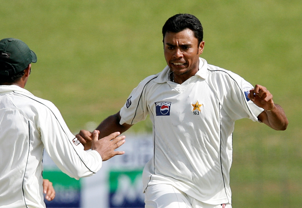 Pakistan's Danish Kaneria celebrates taking the wicket of Sri Lanka's Malinda Warnapura with teammates on the fourth day of their third Test cricket match in Colombo in this file photo. — Reuters