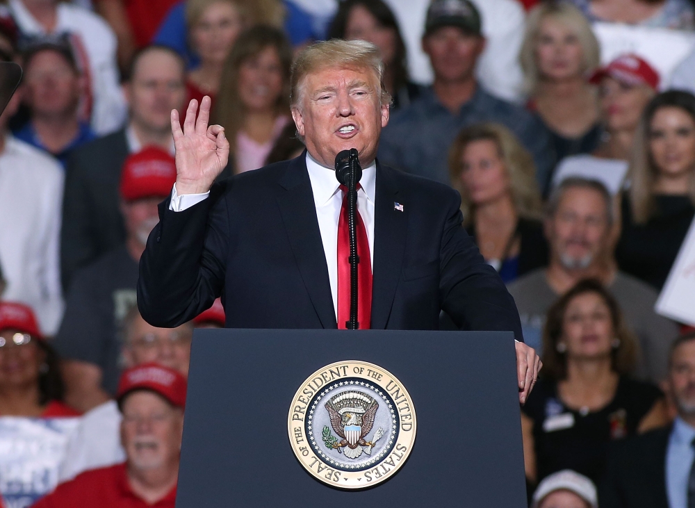 President Donald Trump, seen speaking to a crowd of supporters during a rally at the International Air Response facility in Mesa, Arizona Friday, said he agreed that Saturday's explanation and investigation into what had happened to Saudi journalist Jamal Khashoggi was credible. — AFP