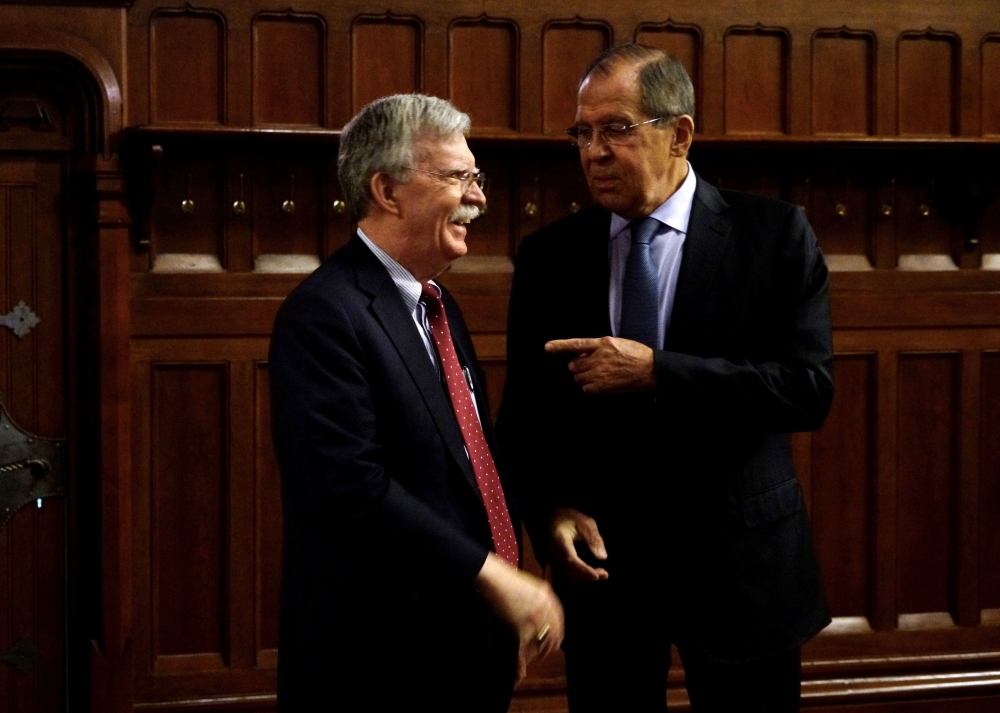 John Bolton, left, National Security Adviser to the US President, speaks with Russian Foreign Minister Sergei Lavrov during their meeting focused on nuclear treaty in Moscow on Monday. — AFP