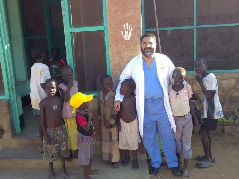 


Dr. Khalid Al-Otaibi with his patients in an African country. The Saudi endoscopic surgeon believes that reaching out to patients is more compassionate than making them travel to the clinics.