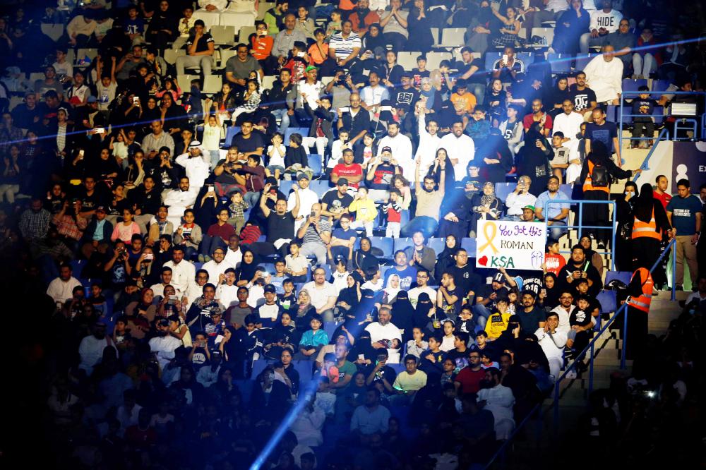Wrestling legend Hulk Hogan greets the crowd during the WWE Crown Jewel show at the King Saud University Stadium in Riyadh Friday. — AFP