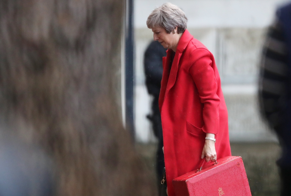Britain’s Prime Minister Theresa May returns to Downing Street in London on Monday. — Reuters