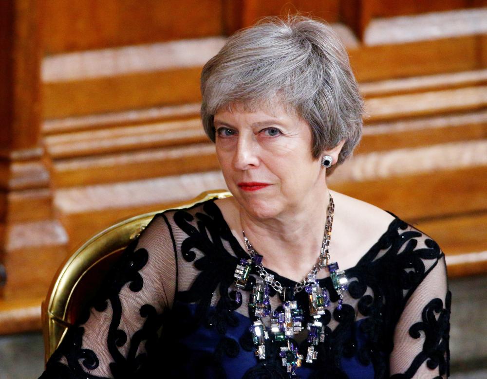 


Britain’s Prime Minister Theresa May looks on during the annual Lord Mayor’s Banquet at Guildhall in London on Monday. — Reuters