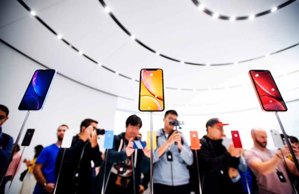 Apple iPhone Xr models rest on display during a launch event in Cupertino, California, in this Sept. 12, 2018 file photo. — AFP