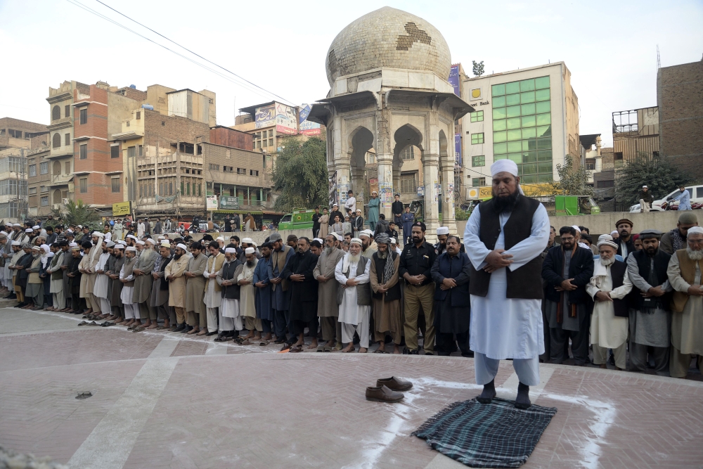 Pakistani Muslims offer absentia pray of superintendent of police (SP) Tahir Dawar who was found dead in Nangarhar provinces of Afghanistan, during a funeral in Peshawar, Pakistan, on Thursday. — AFP