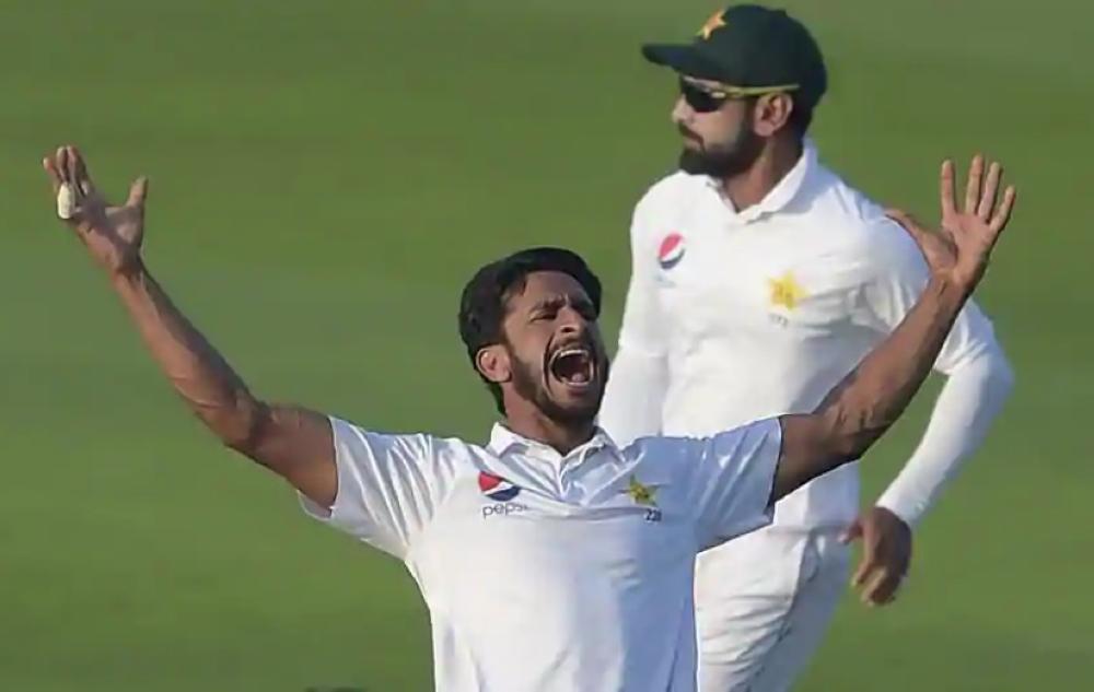 Pakistani bowler Hasan Ali (C) celebrates after taking the wicket of New Zealand batsman Trent Boult during the third day of the first Test cricket match in Abu Dhabi. — AFP
