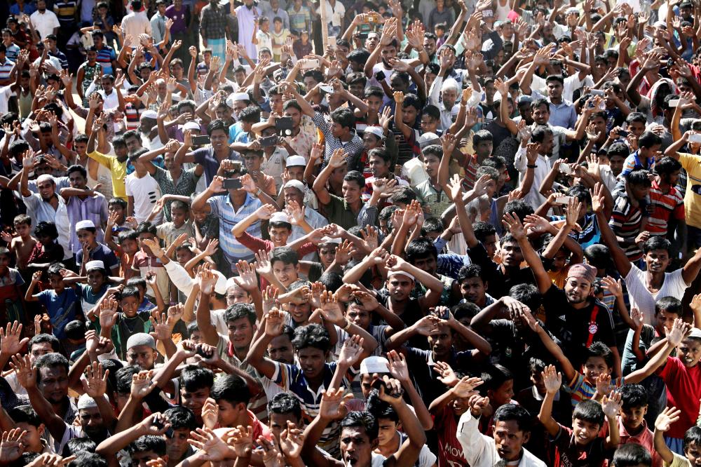 


Hundreds of Rohingya refugees shout slogans as they protest earlier this month against their repatriation at the Unchiprang camp in Teknaf, Bangladesh. — Reuters