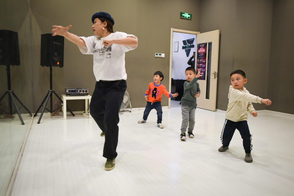 Children practice at a street dance studio in Beijing in this Oct. 26, 2018 file photo. — AFP