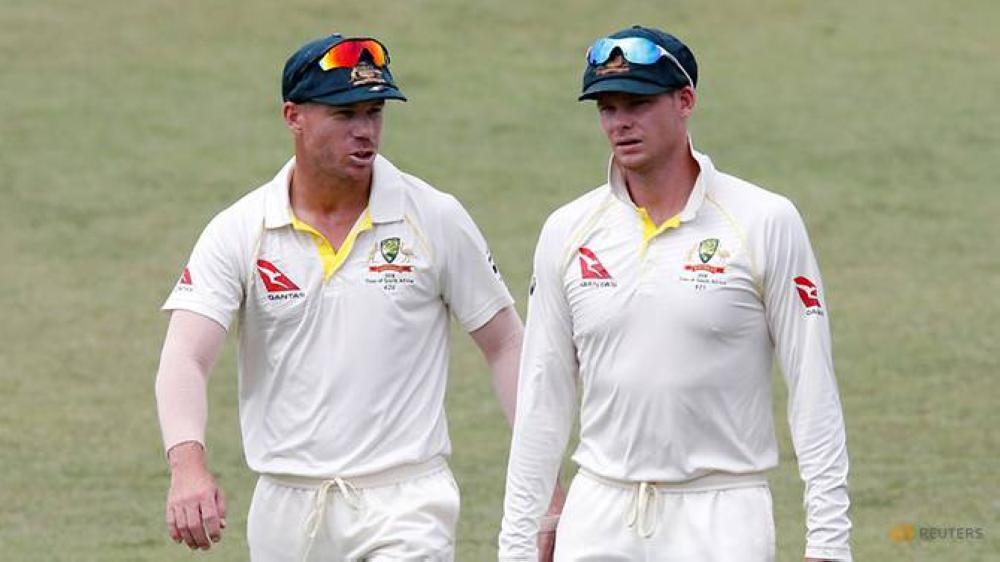 Australia's David Warner and Steve Smith leave the pitch after beating South Africa in the First Test match at the Kingsmead Stadium, Durban, South Africa, in this file photo. — Reuters