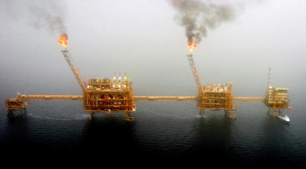 Gas flares from an oil production platform at the Soroush oilfields in the Arabian Gulf, south of the Iranian capital Tehran, in this July 25, 2005, file photo. — Reuters