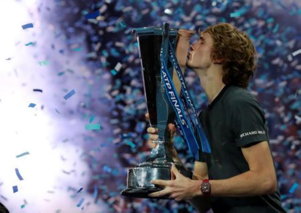 Germany's Alexander Zverev celebrates by kissing the trophy after winning the ATP Finals final against Serbia's Novak Djokovic at the O2, London, Britain, on Sunday. —  Reuters