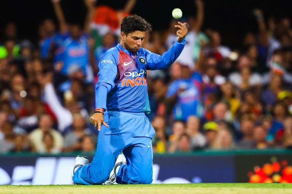 


India’s bowler Kuldeep Yadav celebrates the caught and bowled wicket of Australia’s Chris Lynn during the T20 international cricket match between Australia and India in Brisbane on Wednesday.  — AFP