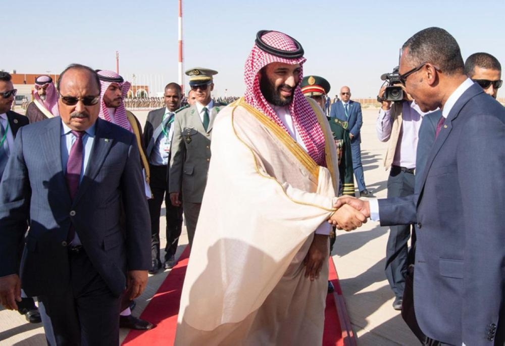 Crown Prince Muhammad Bin Salman, deputy premier and minister of defense, being received by Mauritanian President Mohamed Ould Abdel Aziz at Nouakchott airport on Sunday. — SPA