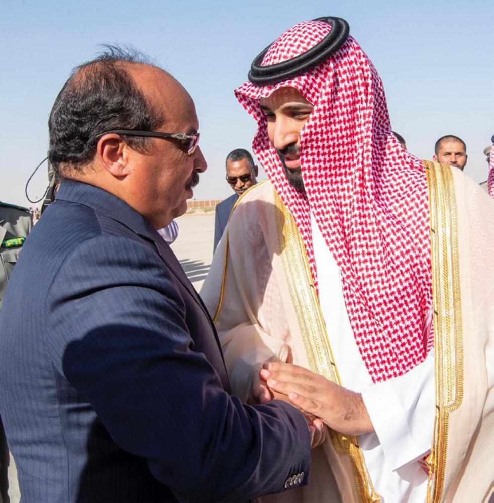 Crown Prince Muhammad Bin Salman, deputy premier and minister of defense, being received by Mauritanian President Mohamed Ould Abdel Aziz at Nouakchott airport on Sunday. — SPA