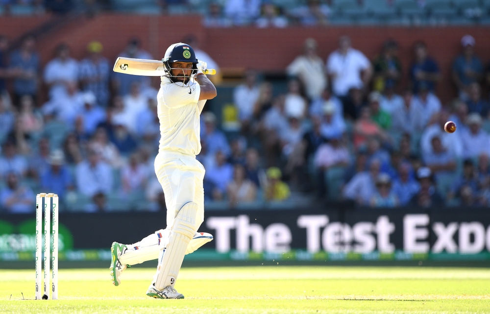 India's Cheteshwar Pujara looks on after playing a shot during day one of the first test match between Australia and India at the Adelaide Oval in Adelaide, Australia, on Thursday. — Reuters
