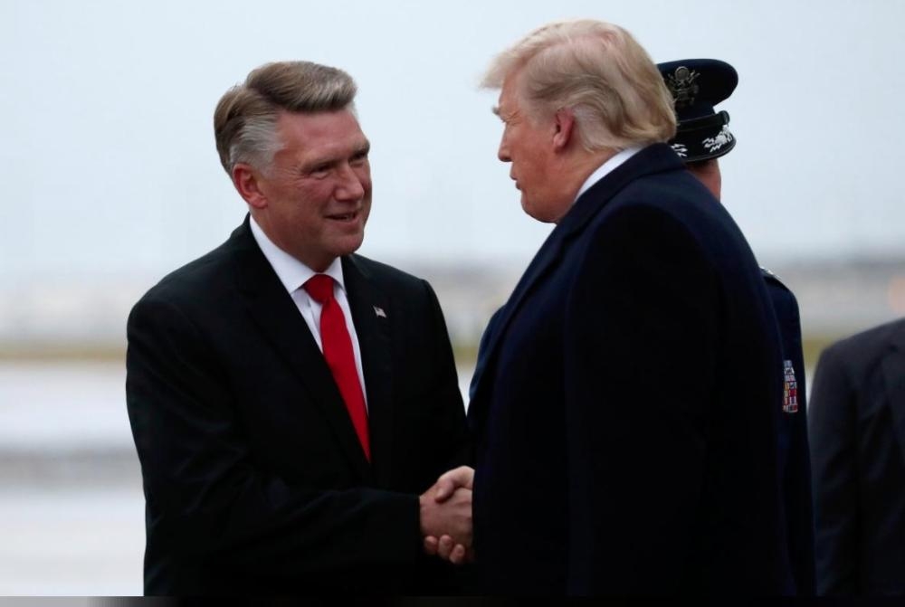 US President Donald Trump greets Mark Harris, Republican candidate from North Carolina's 9th Congressional district, in Charlotte, North Carolina, US. — Reuters