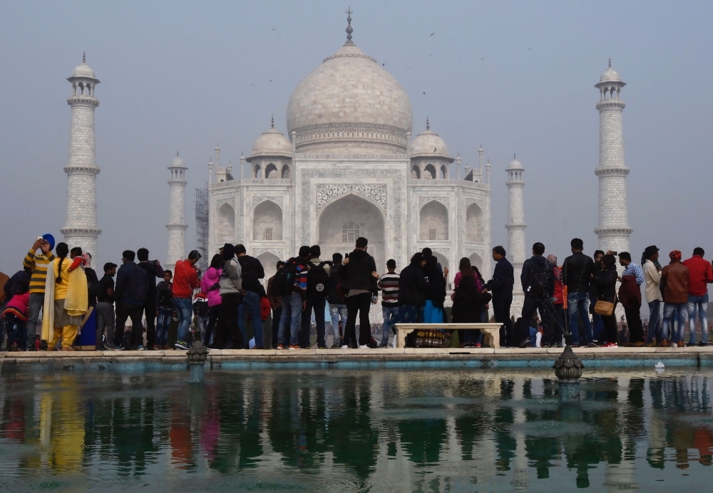 Crowds gather to visit the Taj Mahal in Agra in this Jan. 3, 2018 file photo. — AFP
