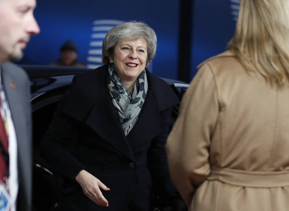 British Prime Minister Theresa May arrives in Brussels on Friday during the second day of a European Summit aimed at discussing the Brexit deal, the long-term budget and the single market. — AFP