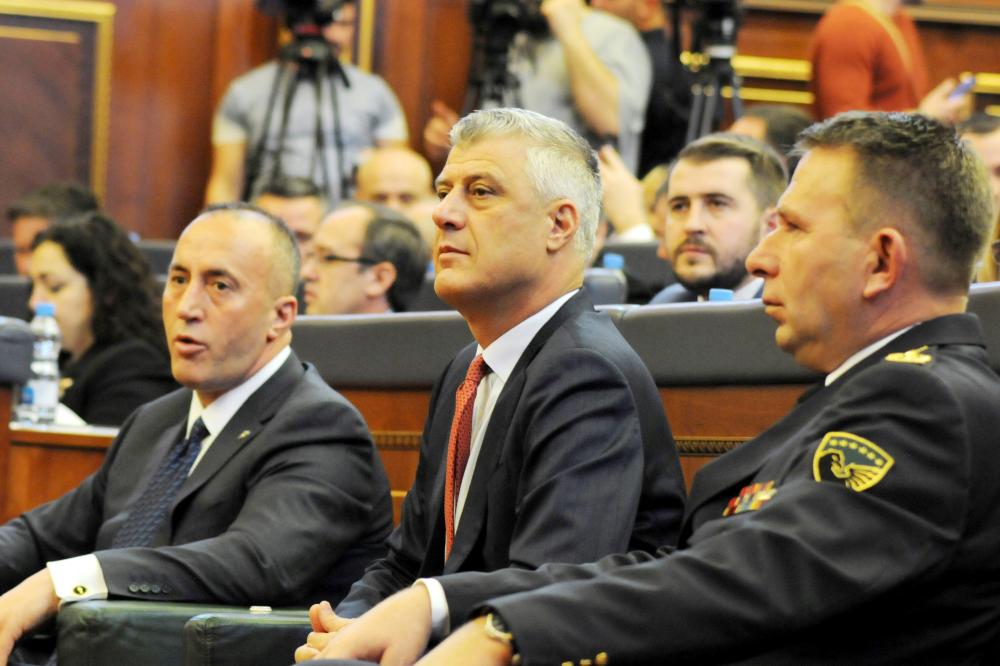 Kosovo's President Hashim Thaci (center), Prime Minister Ramush Haradinaj (left) and Kosovo Security Forces Commander Lt. Gen. Rrahman Rama attend a session after parliament approved formation of national Kosovo army in Pristina, Kosovo, Friday. — Reuters