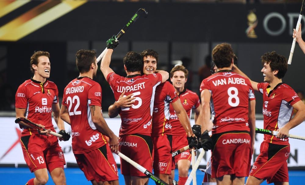 Belgium’s Alexander Hendrickx (C) celebrates with teammates after scoring a goal against England during the field hockey semifinal of the 2018 Hockey World Cup in Bhubaneswar Saturday. — AFP 
