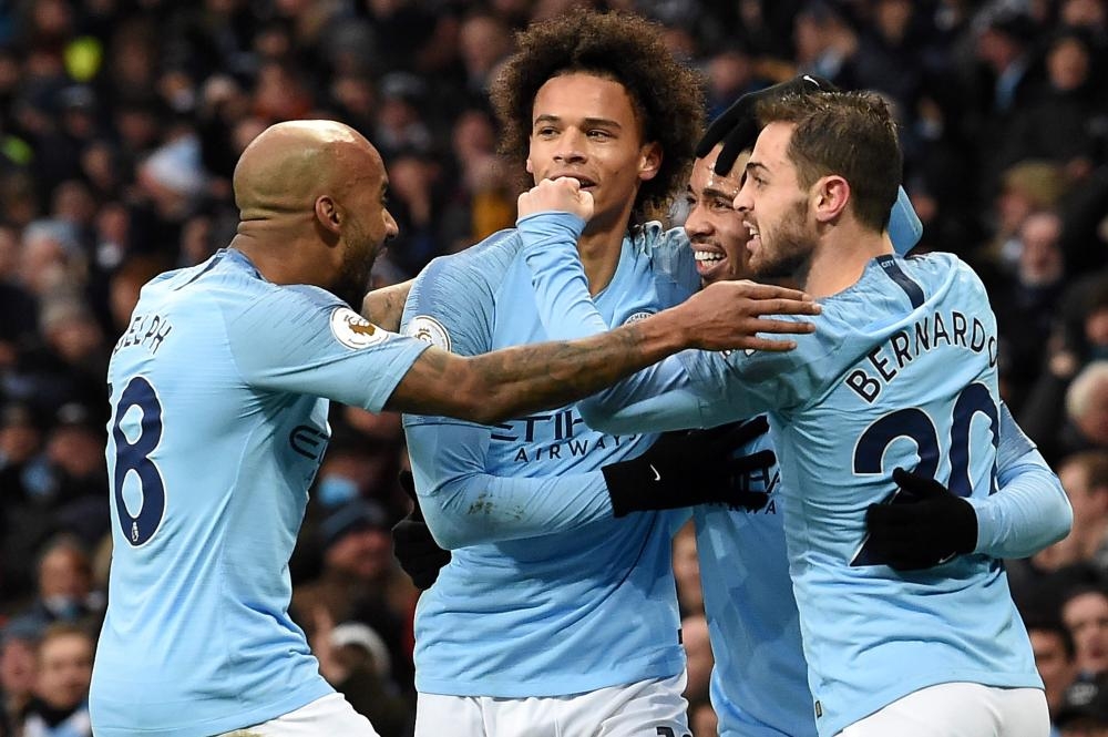 Manchester City's striker Gabriel Jesus (2nd R) celebrates scoring his team's first goal during their English Premier League match against Everton at the Etihad Stadium in Manchester Saturday. — AFP