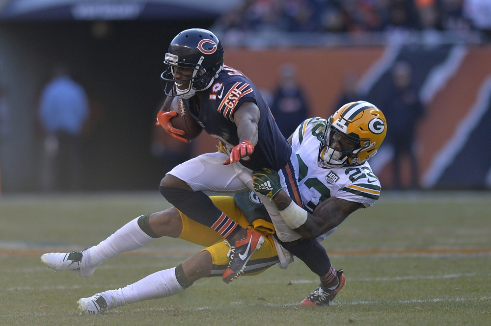 


Chicago Bears’ wide receiver Taylor Gabriel is tackled by Green Bay Packers’ cornerback Jaire Alexander during their NFL game at Soldier Field in Chicago Sunday. — Reuters 