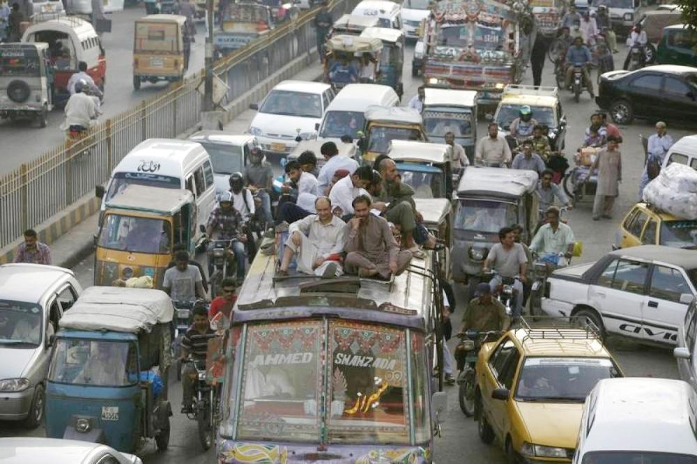 


A bus moves past a banner hanging on a light pole with the picture of Pakistan’s ex-army chief Gen. Raheel Sharif along a road in Karachi, Pakistan, in this Feb. 25, 2016 file photo. — Reuters