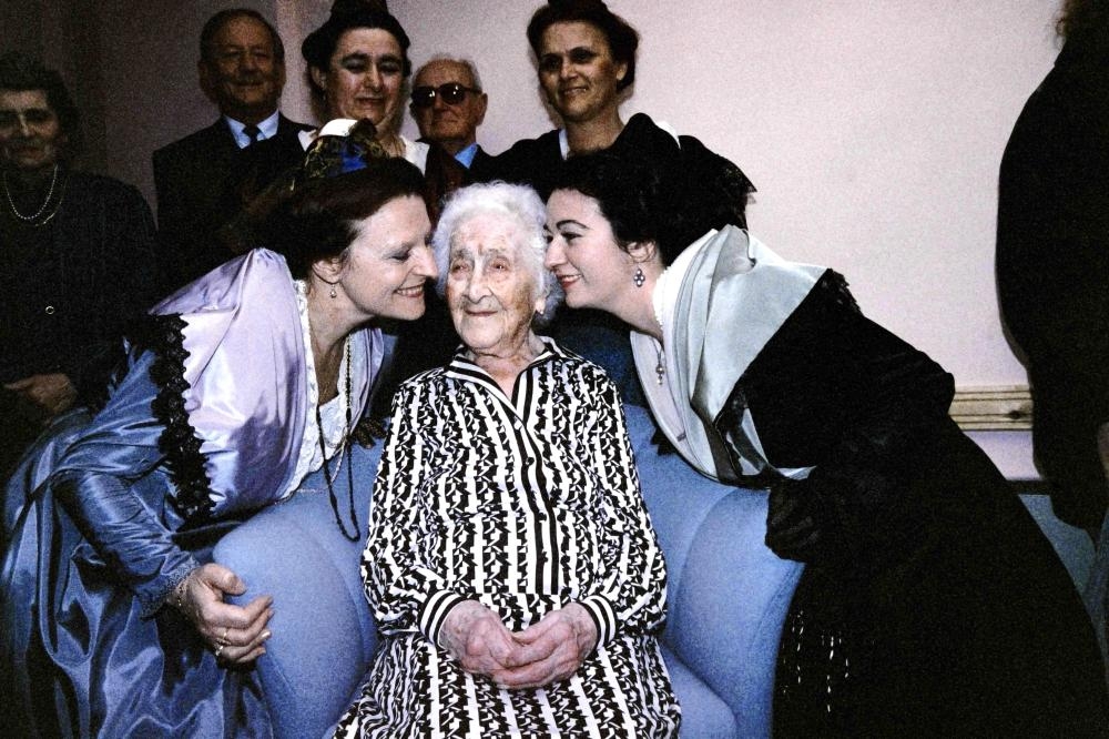 


Two women kiss Jeanne Calment, France’s elder, the day of her 114th birthday in a new retirement home named after her, in Arles, in this May 14, 2013 file photo. — AFP