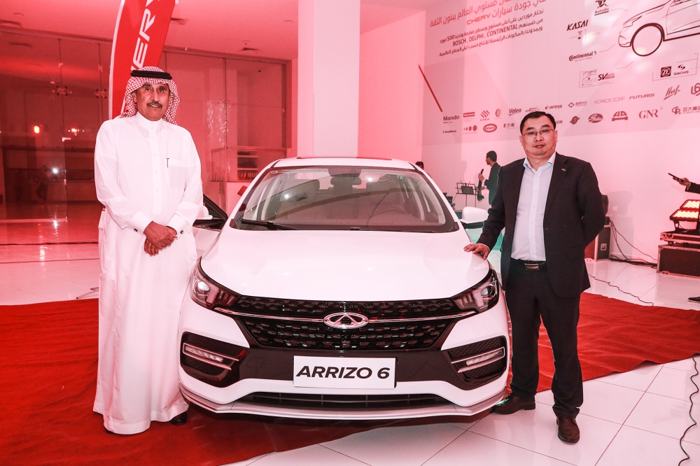 Zhang Guibing, CEO of Chery;  Shaik Said Al- Yemni, President of Al- Yemni Motors Co, the authorized dealer of Chery in Saudi Arabia, during the opening