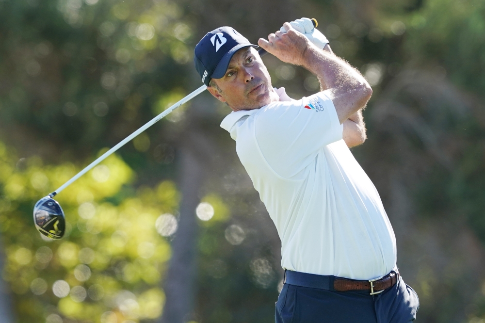 


PGA golfer Matt Kuchar tees off on the first hole during the second round of the Sony Open in Hawaii Golf Tournament at Waialae Country Club Friday. — Reuters