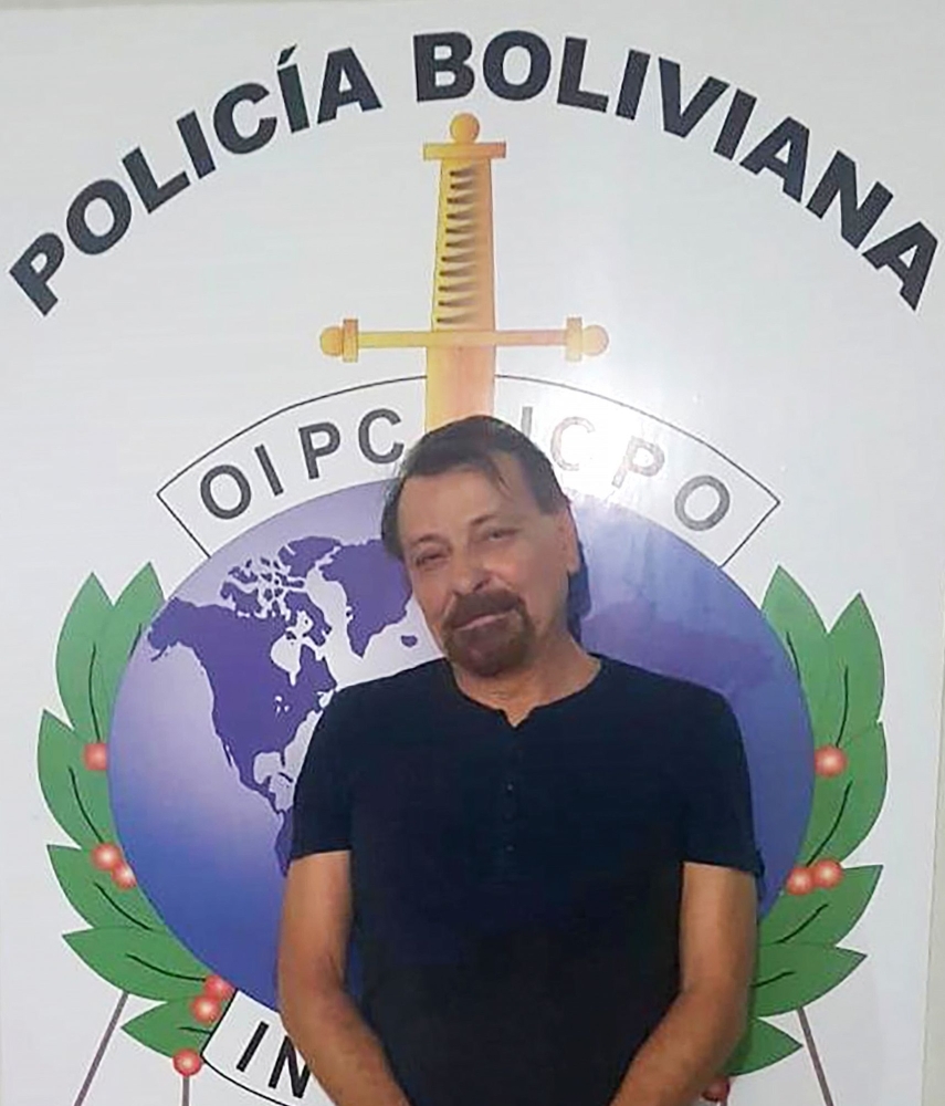 Former far-left Italian militant Cesare Battisti after he was arrested in the Bolivian city of Santa Cruz de la Sierra, late Saturday. —  AFP