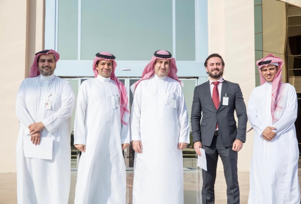 SABIC officials Fouzan Al Shamekh (middle) – Liquid Supply Chain Director, Petrochemicals and Mohammad Al Sahil (second to the left) -  Liquid Supply Chain MEAF Sr. Manager with Khaled Mengash (right) – Customer Service Manager, and Tareq Abanmee (left) – MEAF Customer Service. United Stars Country Manager Aous Mahmoud Ahmed Ali is second to the right at the signing of contract