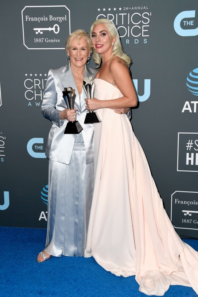 SANTA MONICA, CA - JANUARY 13: Glenn Close (L), winner of Best Actress for 'The Wife', and Lady Gaga, winner of Best Actress for 'A Star Is Born,' pose in the press room during the 24th annual Critics' Choice Awards at Barker Hangar on January 13, 2019 in Santa Monica, California.   Frazer Harrison/Getty Images/AFP
== FOR NEWSPAPERS, INTERNET, TELCOS & TELEVISION USE ONLY ==
