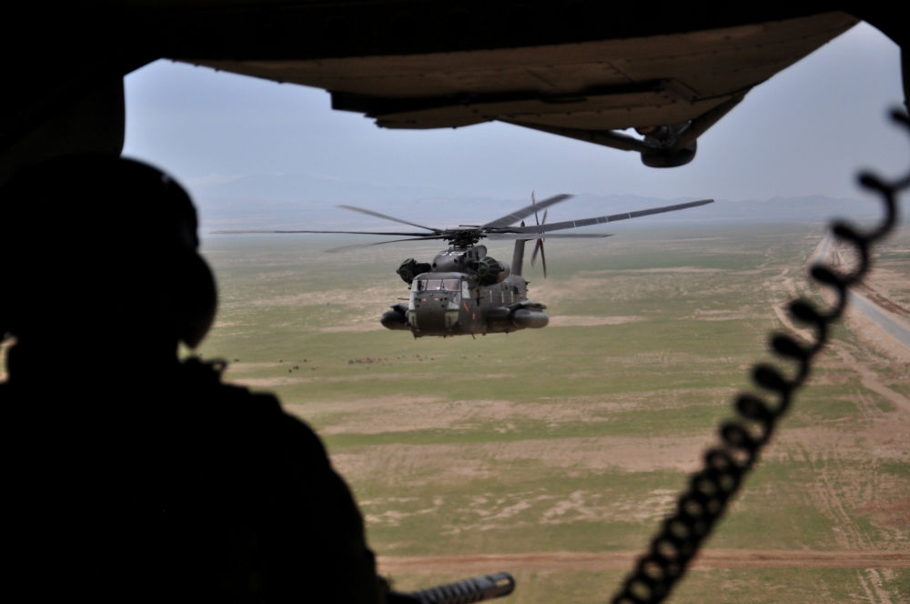 A soldier of the German armed forces Bundeswehr in a CH-53 helicopter on their way from Kunduz to Mazar-i-Sharif, Afghanistan, in this March 27, 2017 file photo. — Reuters