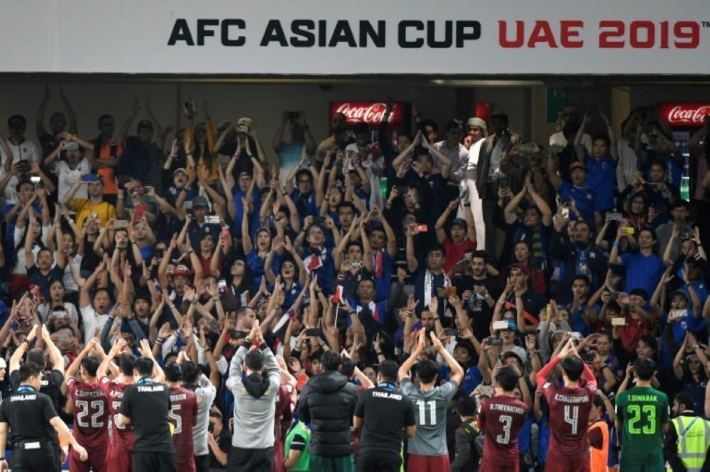 While some fans at the Asian Cup may not be familiar with the chant's origins, they make up for it in enthusiasm. — AFP