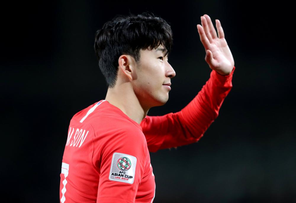 South Korea's Son Heung-min waves to the fans after their Group C match of the Asian Cup against China at Al Nahyan Stadium in Abu Dhabi Wednesday. — Reuters