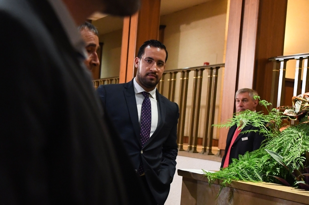 Former Elysee senior security officer Alexandre Benalla, center, leaves a Senate committee as he is quizzed over his close ties to France’s leader in Paris in this Sept. 19, 2018 file photo. — AFP