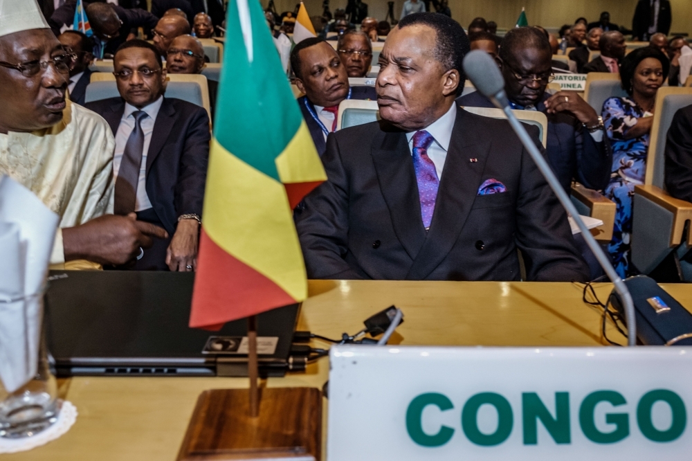 Republic of the Congo’s President Denis Sassou Nguesso, right, and Chadian President Idriss Deby, left, speak together before a High Level Consultation Meeting with African leaders on D.R. Congo election at the AU headquarters in Addis Ababa on Friday. — AFP